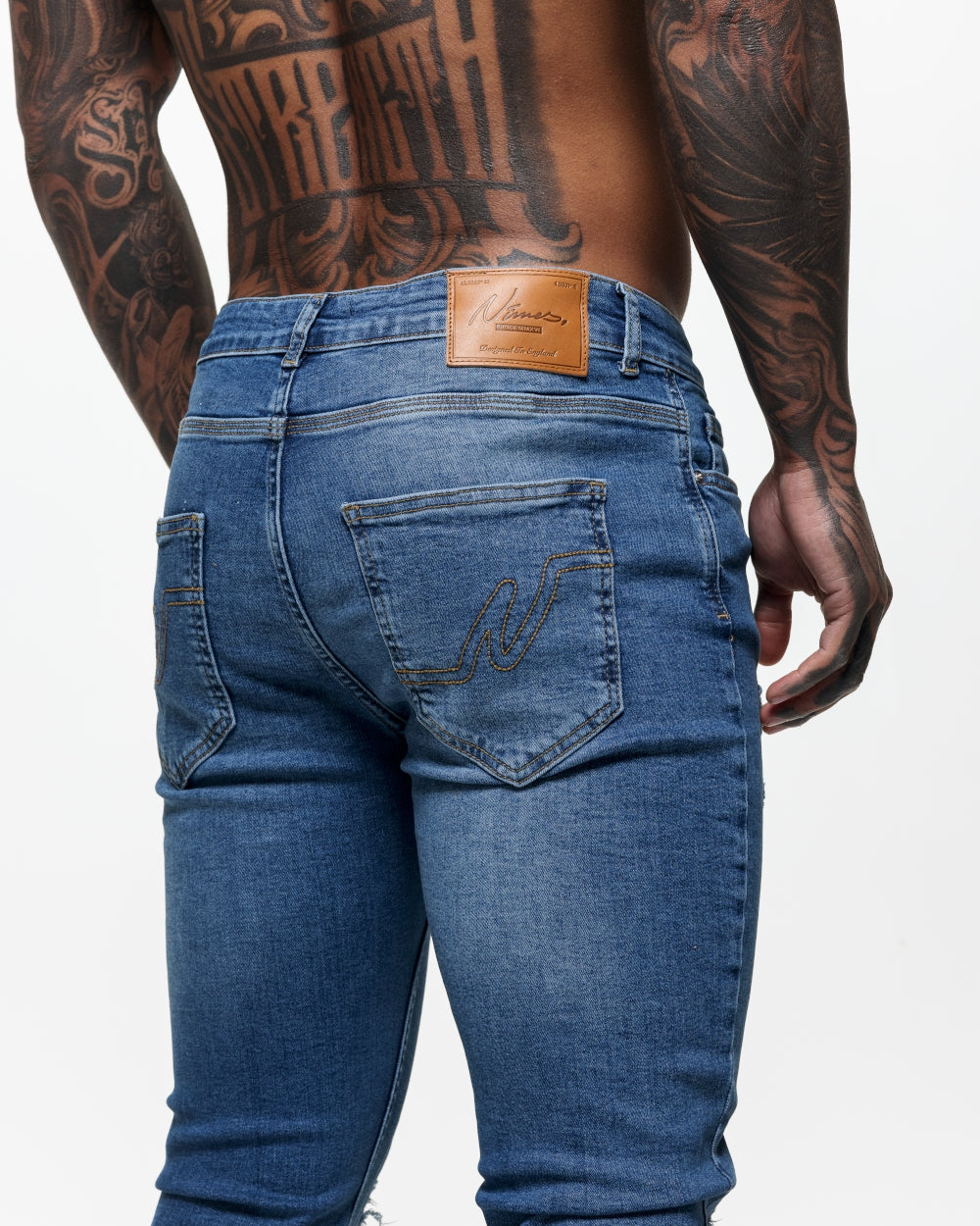 Ripped &amp; Repaired Skinny Jeans - Blue Wash