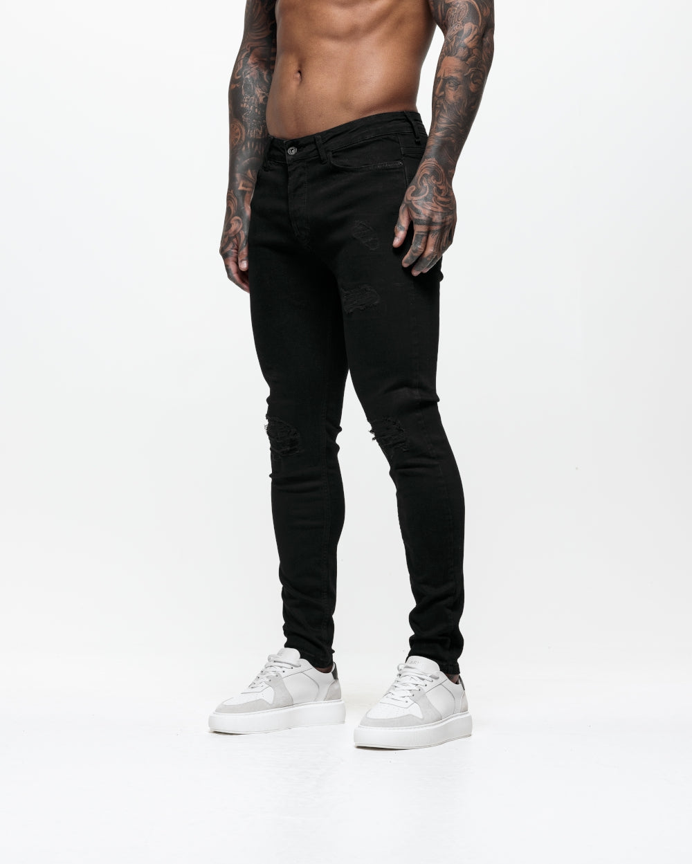 Ripped &amp; Repaired Skinny Jeans - Black