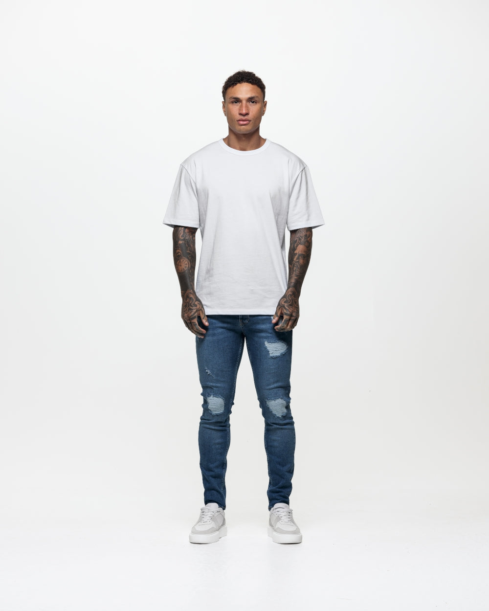 Ripped &amp; Repaired Skinny Jeans - Blue Wash